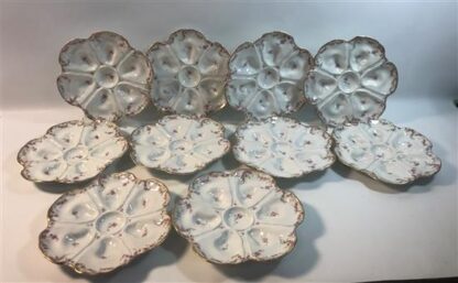 SET OF LIMOGES OYSTER PLATES WITH PINK FLORAL MOTIF, 9" France C.1900